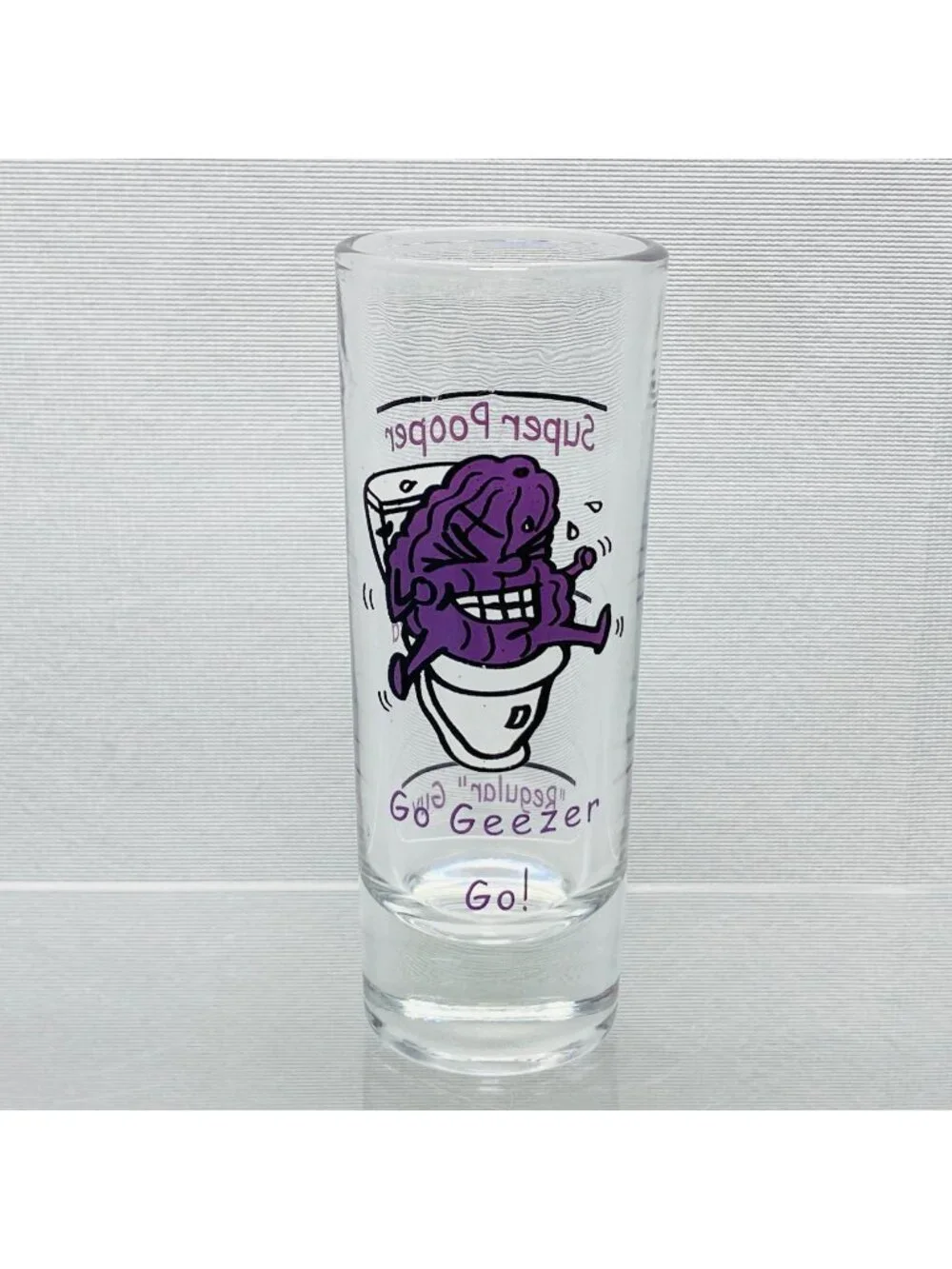 Super Pooper Shot Glass With Purple Prune Cartoon  Funny 